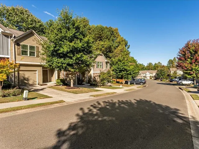 a view of a street with houses