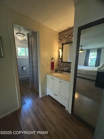 a kitchen with a refrigerator and a stove