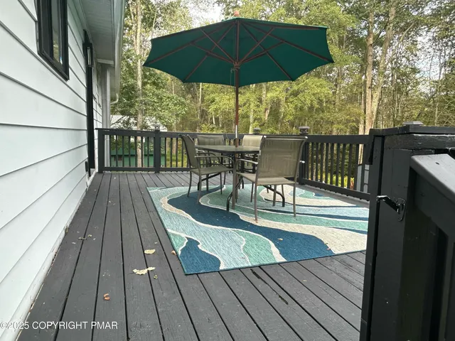 a view of balcony deck and patio