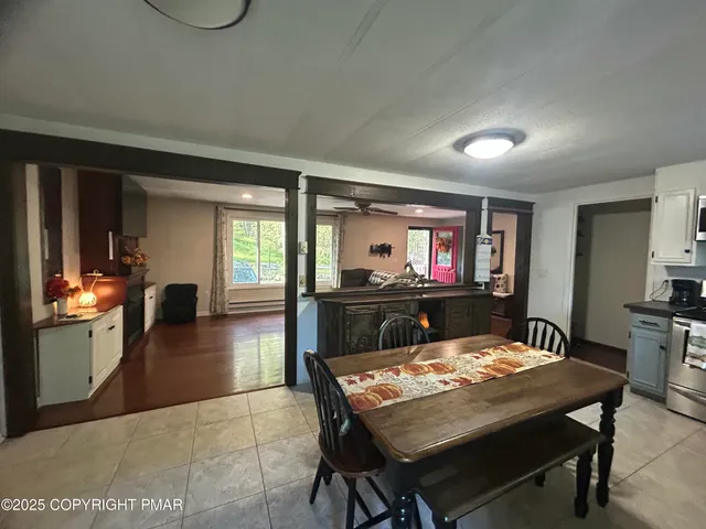 a view of a dining room with furniture