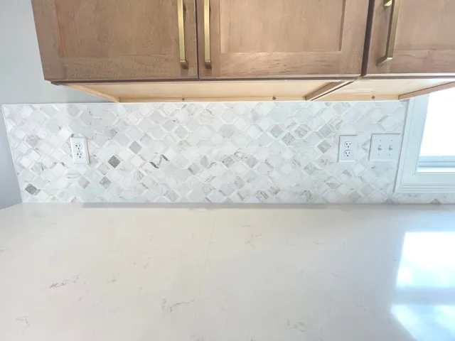 a close up of a sink with a window