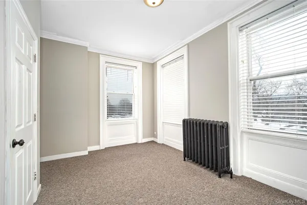 a view of livingroom with furniture and a window