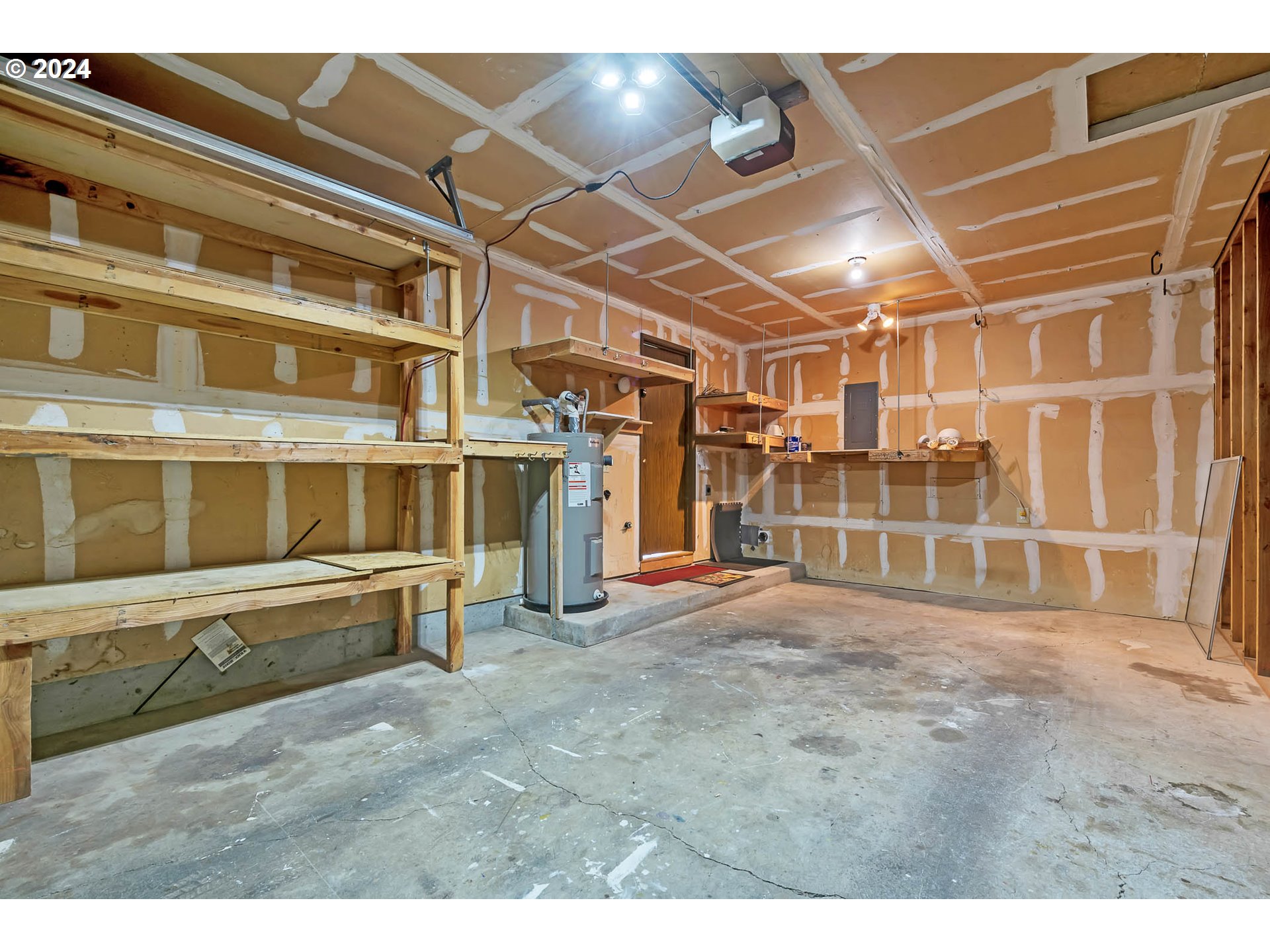 6112 Main Street Springfield, OR 97478 - Photo 18 of 47 a view of an empty room with wooden floor and windows