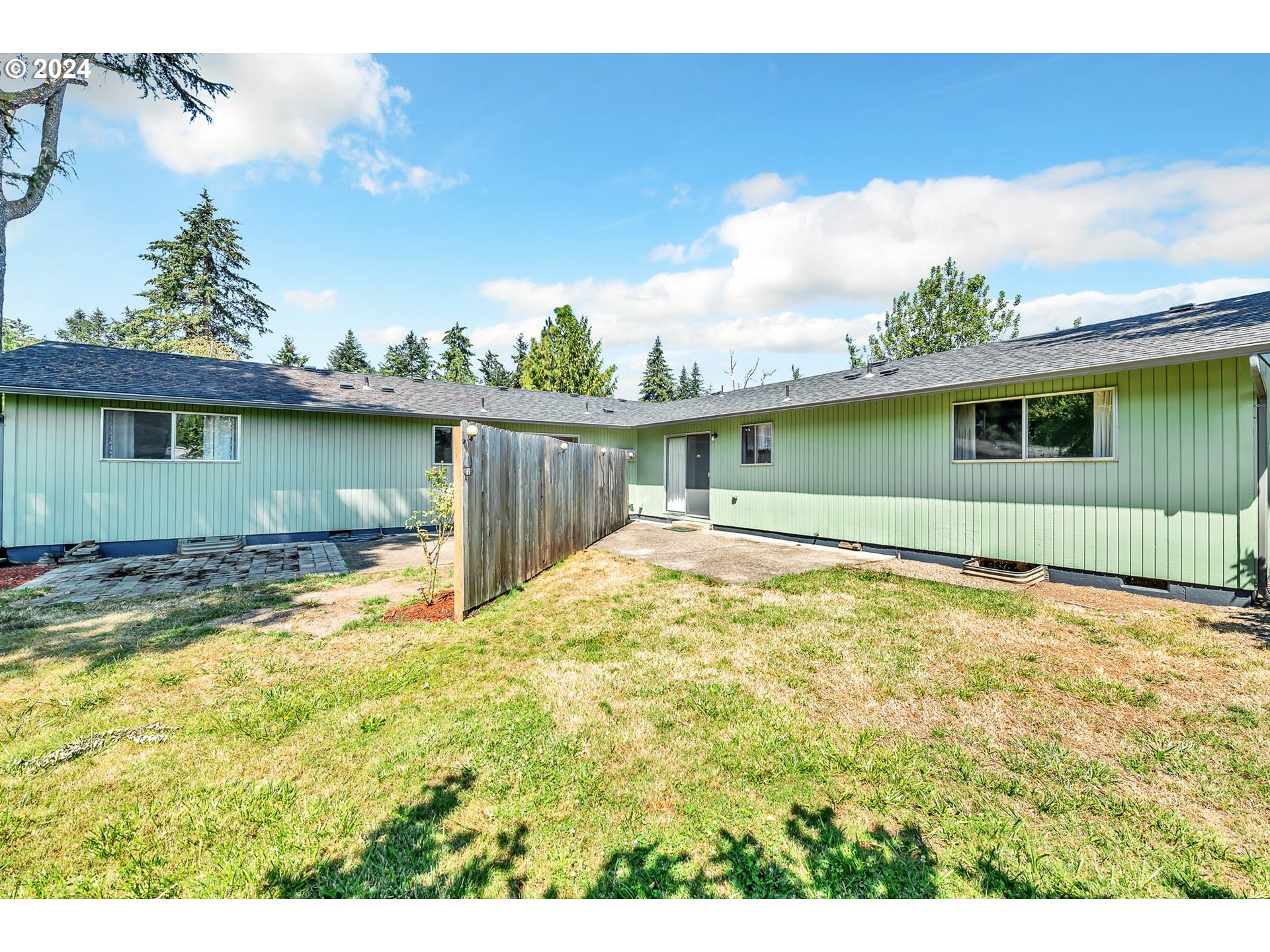 6112 Main Street Springfield, OR 97478 - Photo 21 of 47 a view of a backyard with a lake view