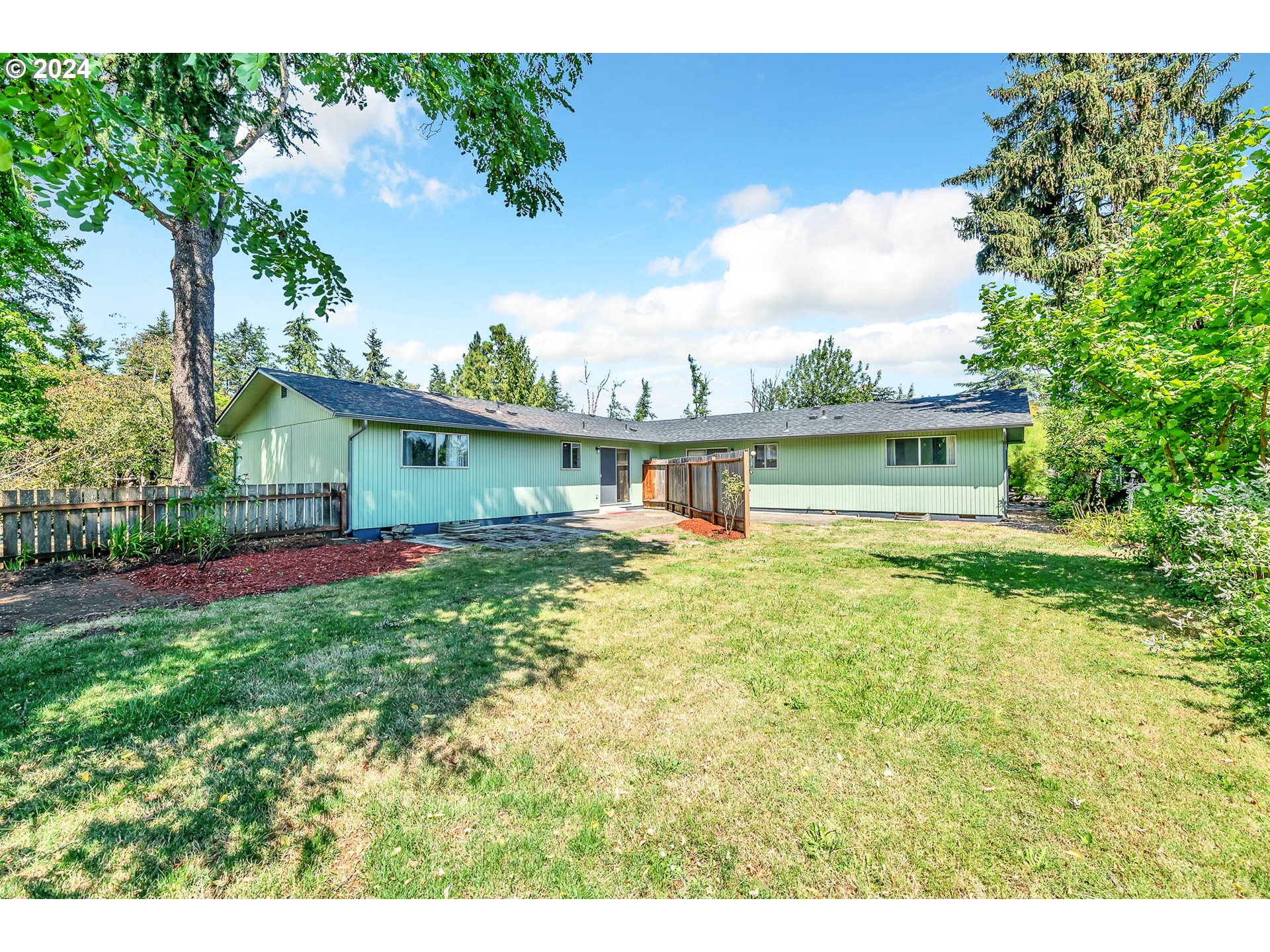 6112 Main Street Springfield, OR 97478 - Photo 22 of 47 a view of house with outdoor space