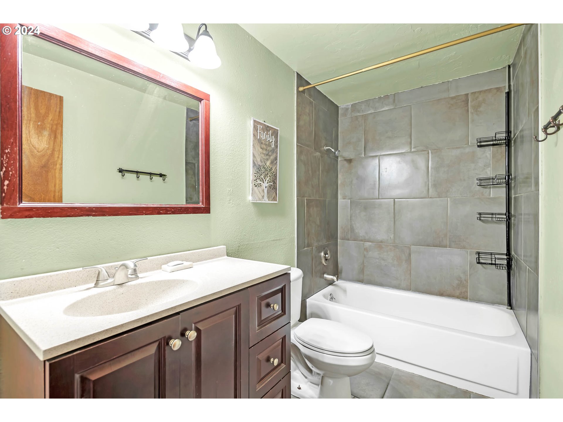 6112 Main Street Springfield, OR 97478 - Photo 37 of 47 a bathroom with a sink a toilet and shower