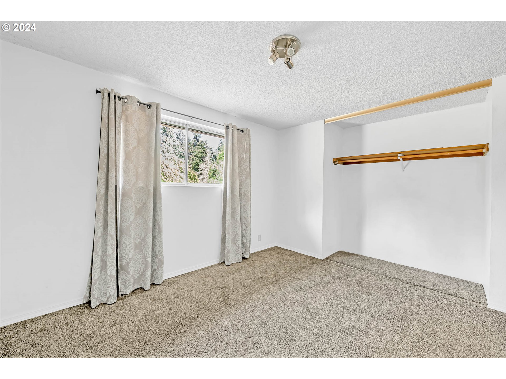 6112 Main Street Springfield, OR 97478 - Photo 38 of 47 a view of an empty room with windows
