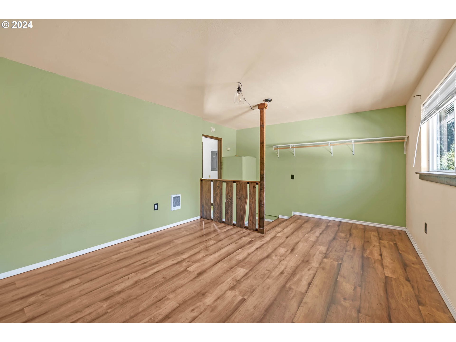 6112 Main Street Springfield, OR 97478 - Photo 44 of 47 a view of empty room with wooden floor and fan