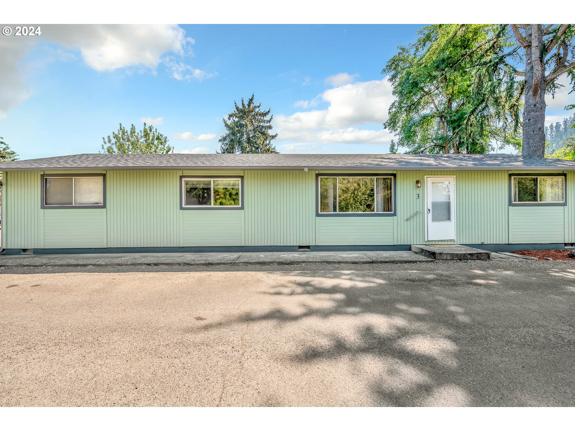 6112 Main Street Springfield, OR 97478 - Photo 45 of 47 a view of a house with a backyard