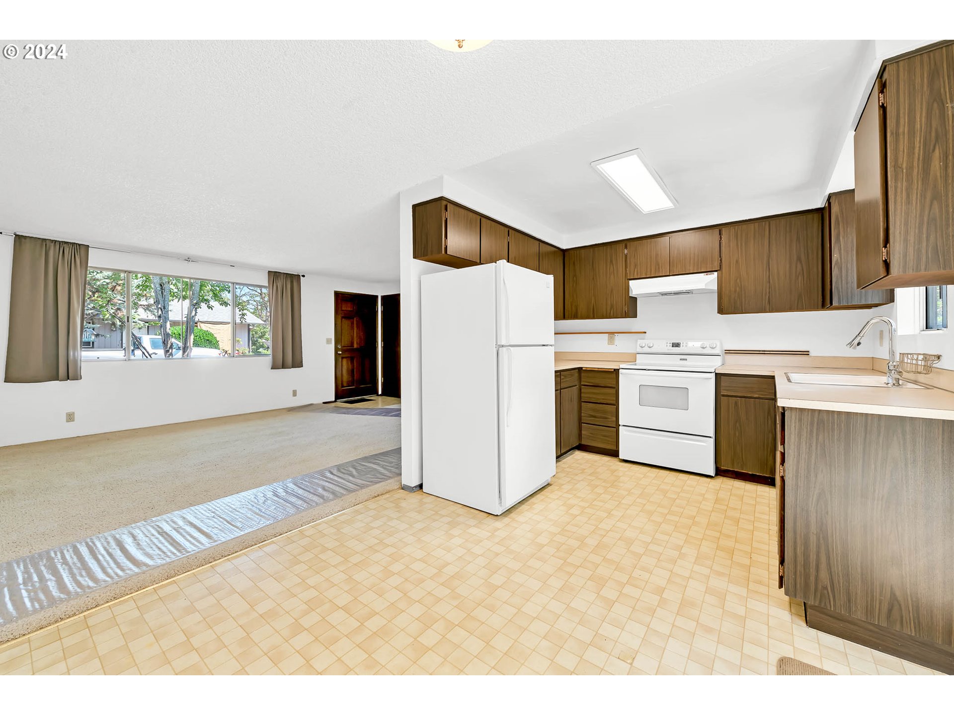 6112 Main Street Springfield, OR 97478 - Photo 8 of 47 a view of a kitchen with a sink