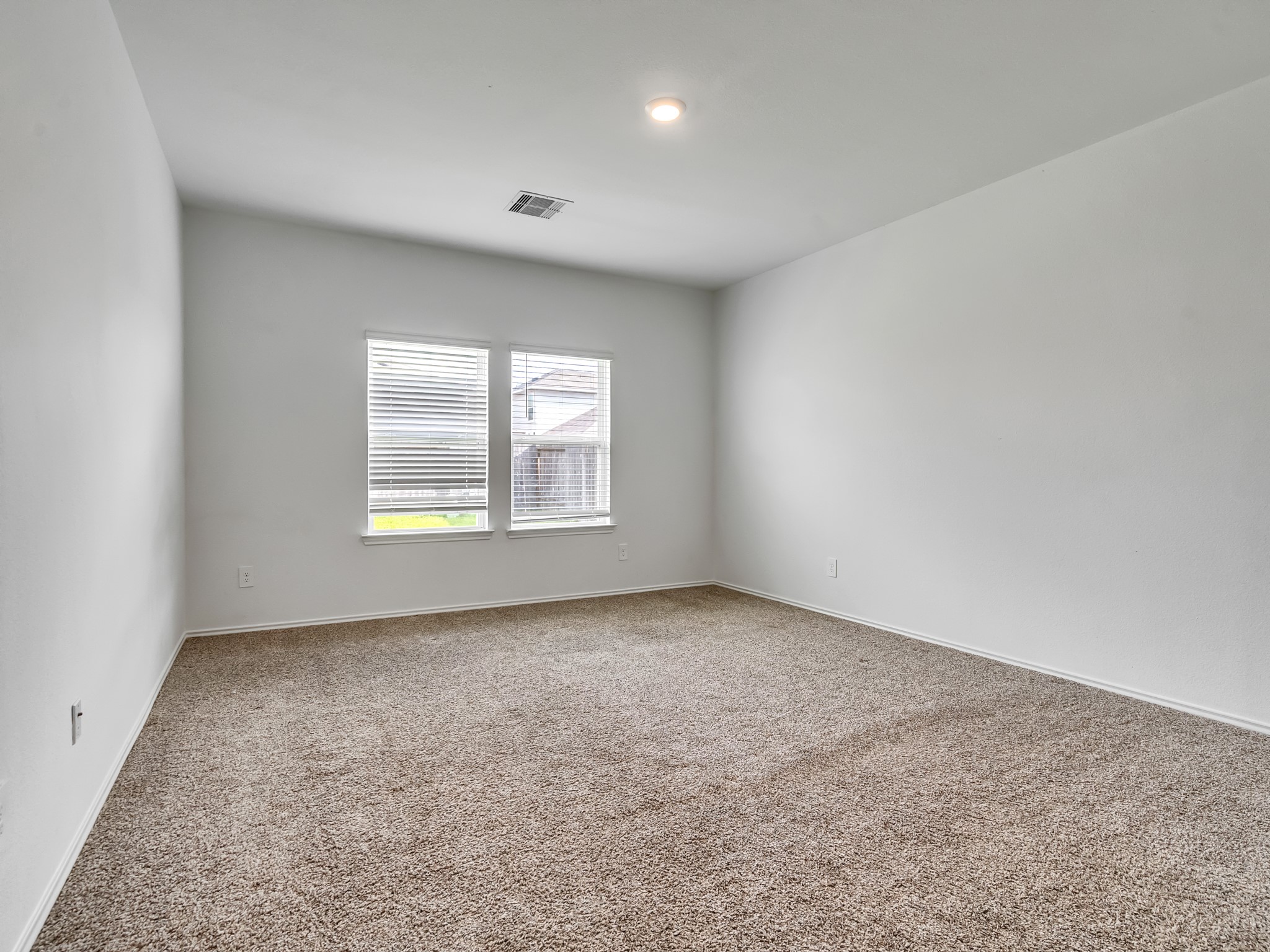 5431 Tuscany Hills Lane Spring, TX 77373 - Photo 20 of 22 an empty room with windows
