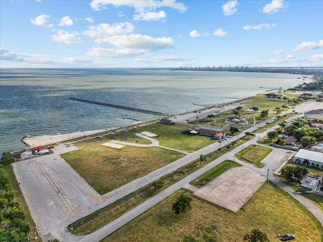 a view of a swimming pool with an ocean view