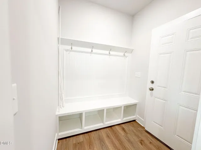 a view of a living room and floor to ceiling window