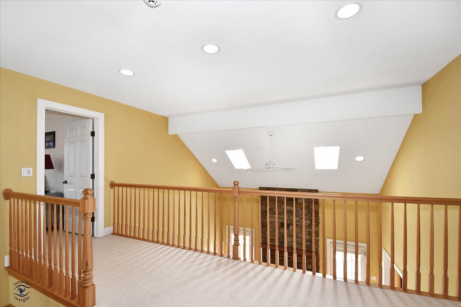 617 Hillside Road Glenview, IL 60025 - Photo 19 of 46 a view of a hallway with wooden floor