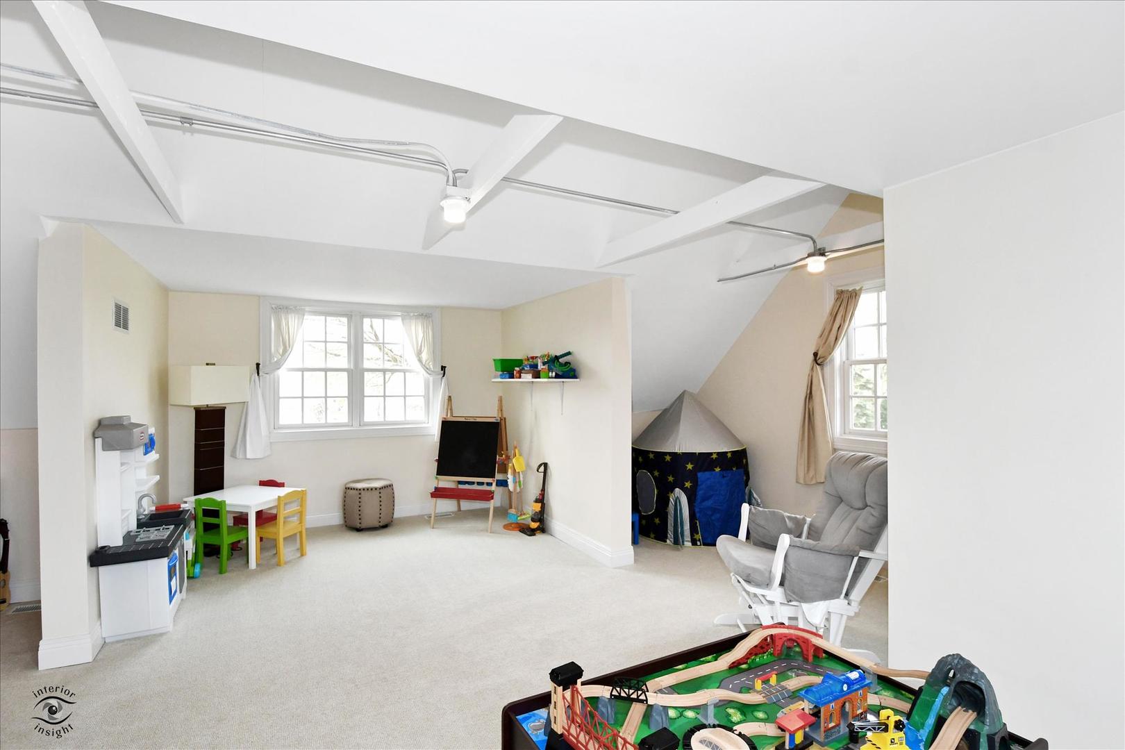 617 Hillside Road Glenview, IL 60025 - Photo 23 of 46 a bed room with furniture and a wooden floor