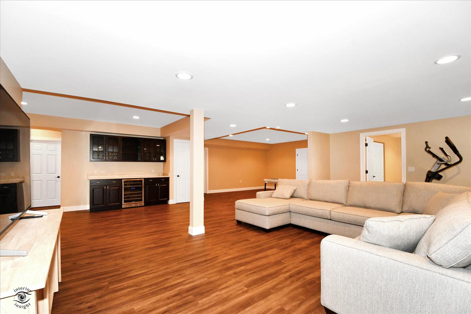617 Hillside Road Glenview, IL 60025 - Photo 32 of 46 a living room with furniture and a fireplace