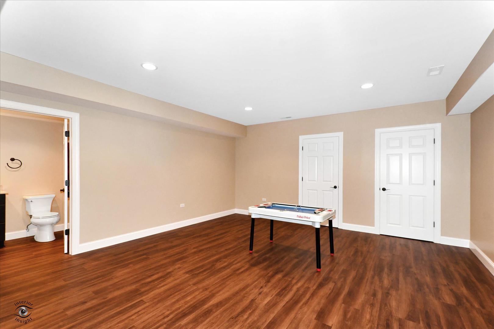 617 Hillside Road Glenview, IL 60025 - Photo 34 of 46 a view of room with wooden floor and wooden floor