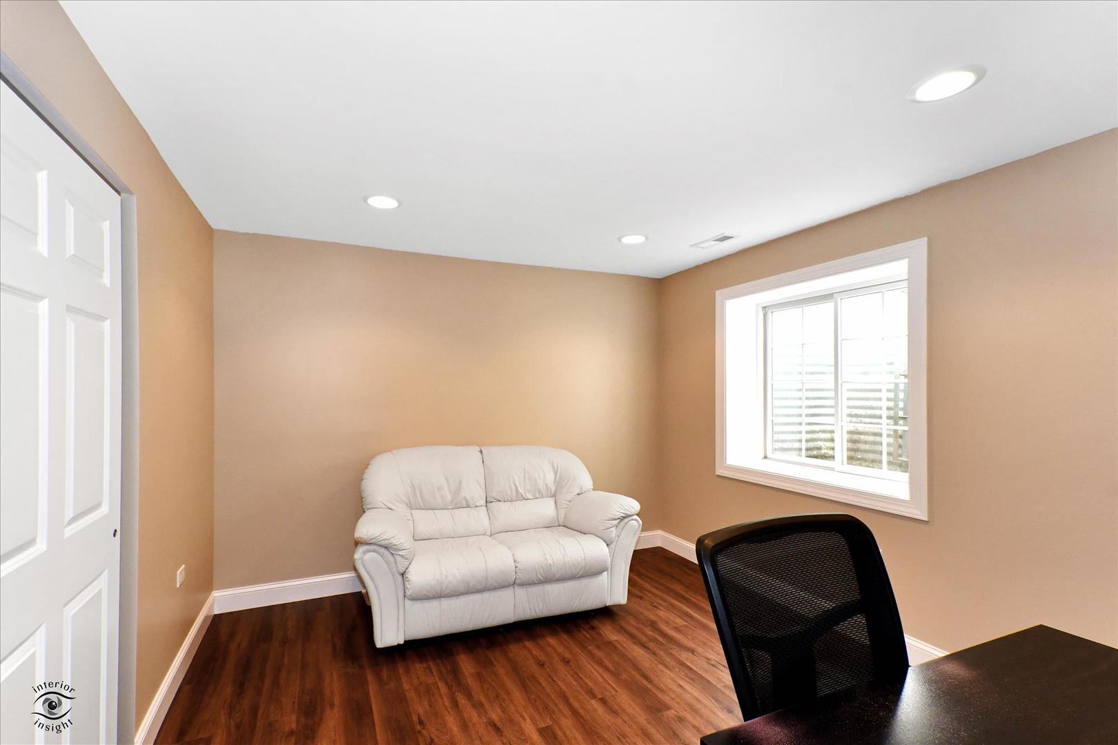 617 Hillside Road Glenview, IL 60025 - Photo 35 of 46 a living room with furniture and a window