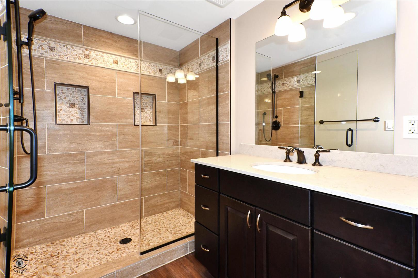 617 Hillside Road Glenview, IL 60025 - Photo 36 of 46 a bathroom with a shower sink and mirror