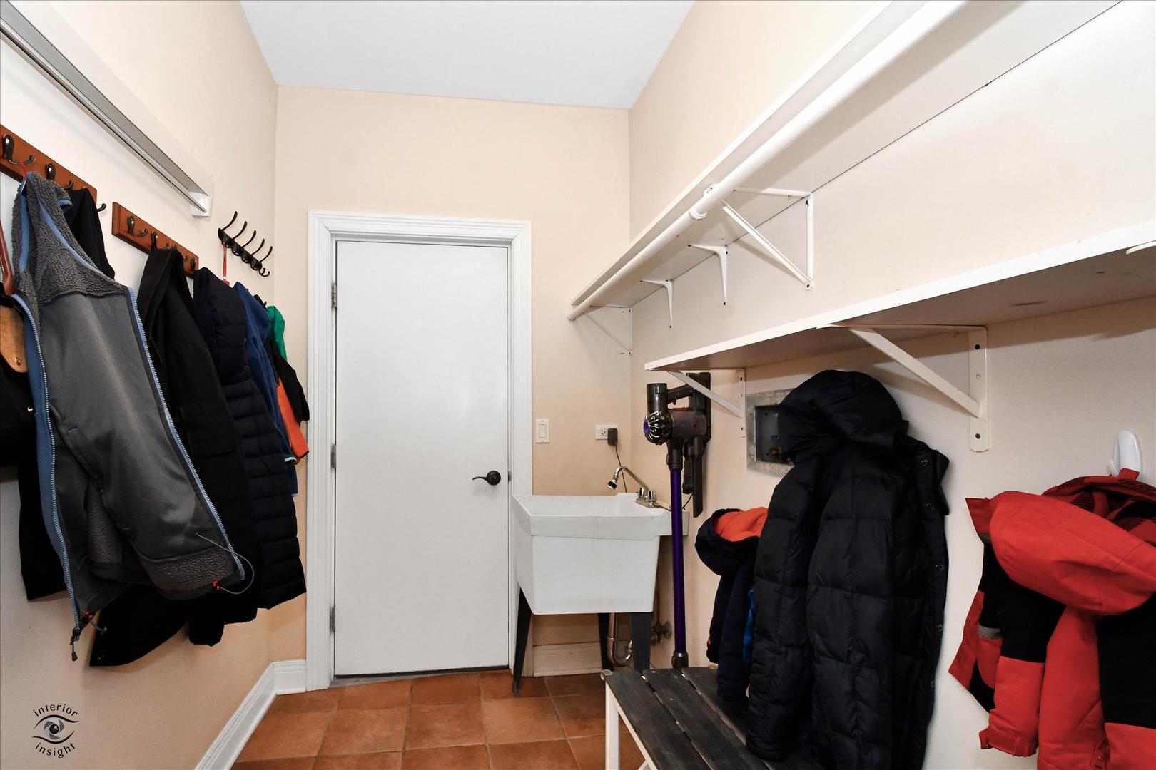 617 Hillside Road Glenview, IL 60025 - Photo 39 of 46 a view of walk in closet with clothes and shoes