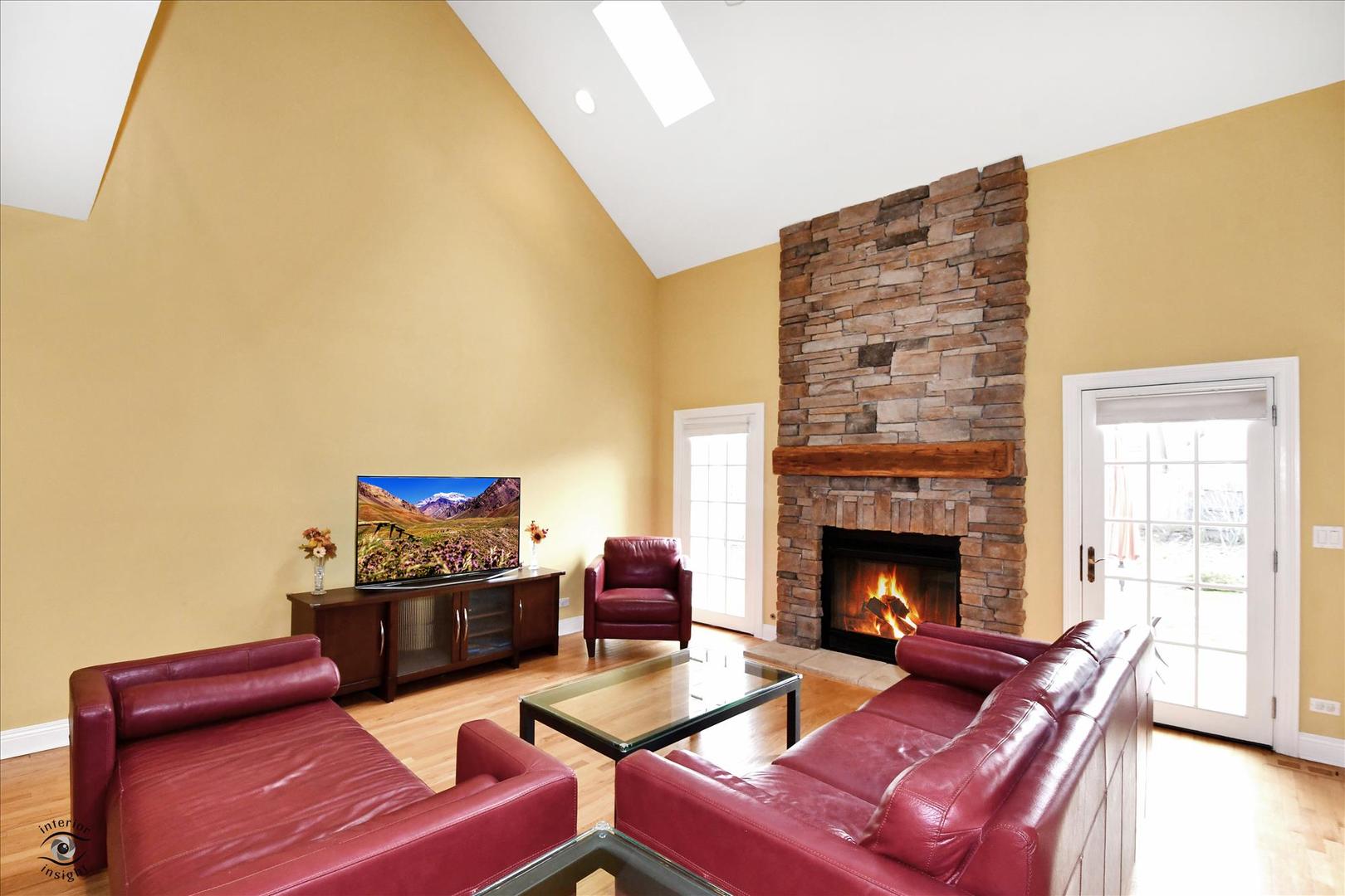 617 Hillside Road Glenview, IL 60025 - Photo 5 of 46 a living room with furniture and a fireplace