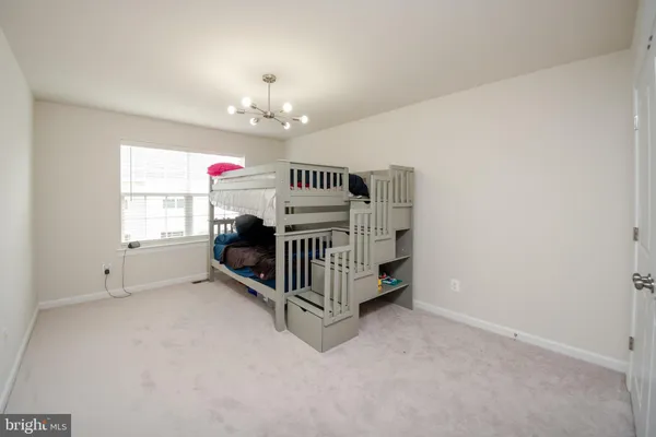 en suite bathroom with a sink and a mirror