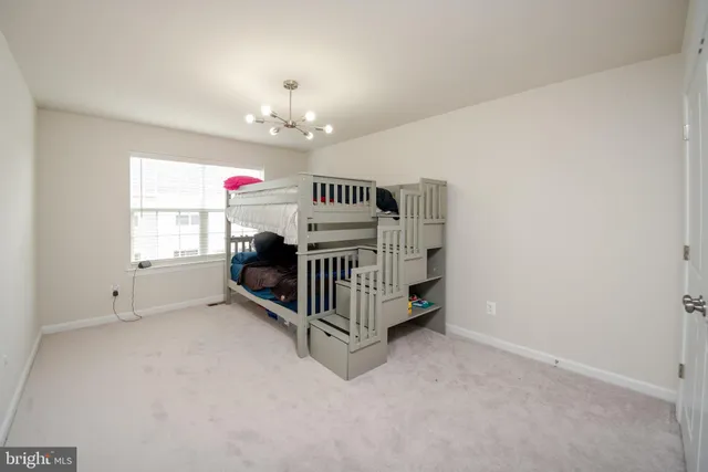 en suite bathroom with a sink and a mirror