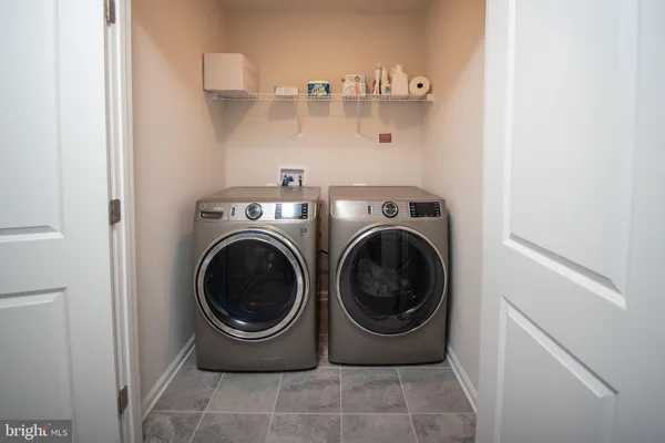 a view of washer and dryer in a utility room