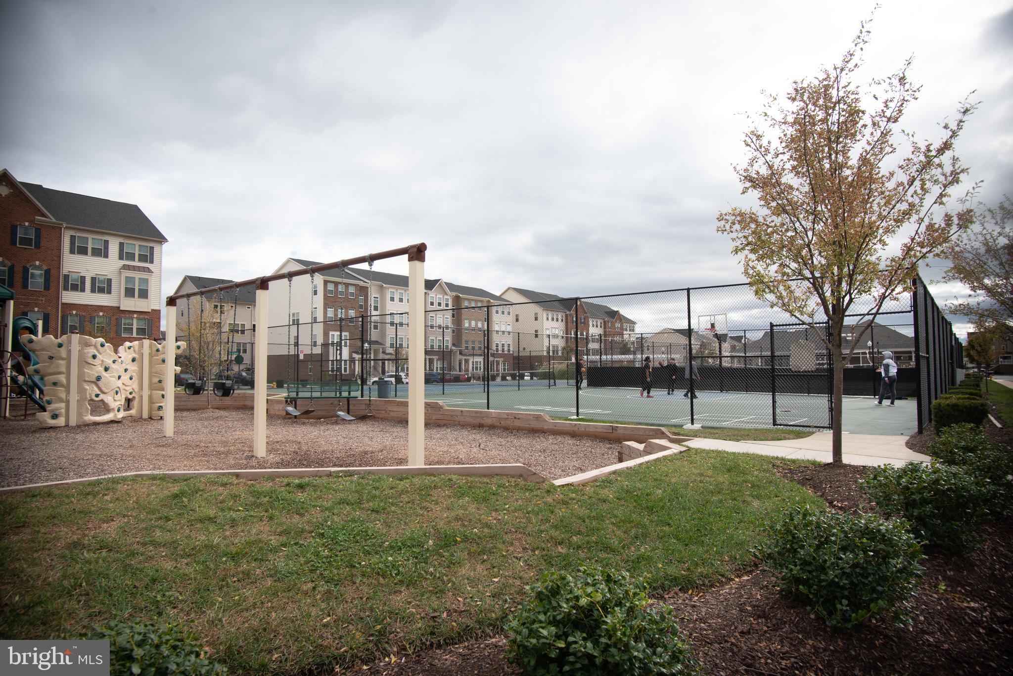 5907 Krantz Drive Frederick, MD 21703 - Photo 29 of 30 a view of a playground ground and a building