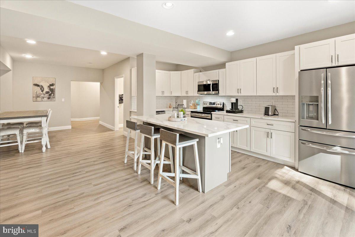 5131 Woodville Road Mount Airy, MD 21771 - Photo 63 of 92 Lower Level - Kitchen and Dining Area