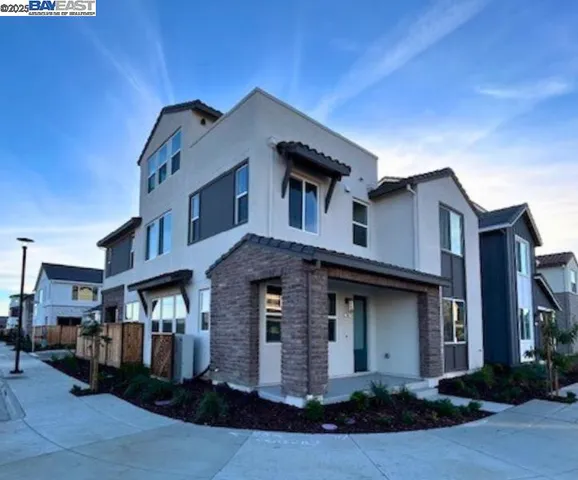 a front view of a house with yard