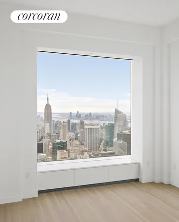 a view of a living room with a large window