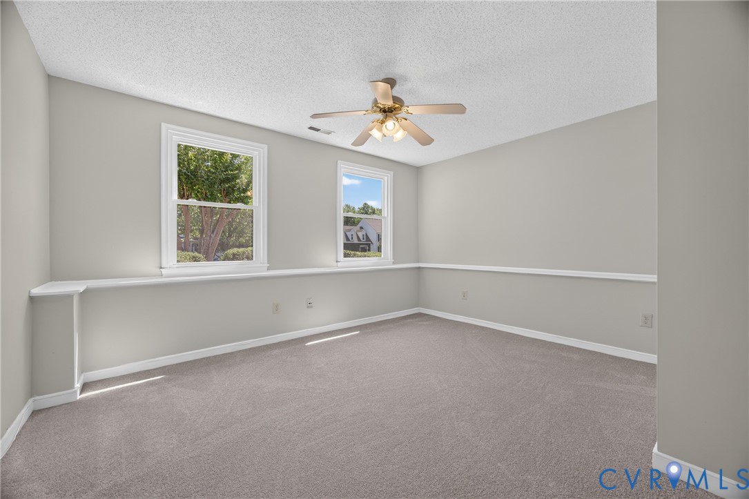 1559 Tree Ridge Road Henrico, VA 23231 - Photo 29 of 40 Carpeted room with light grey walls and white trim