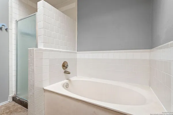 a bathroom with a bathtub