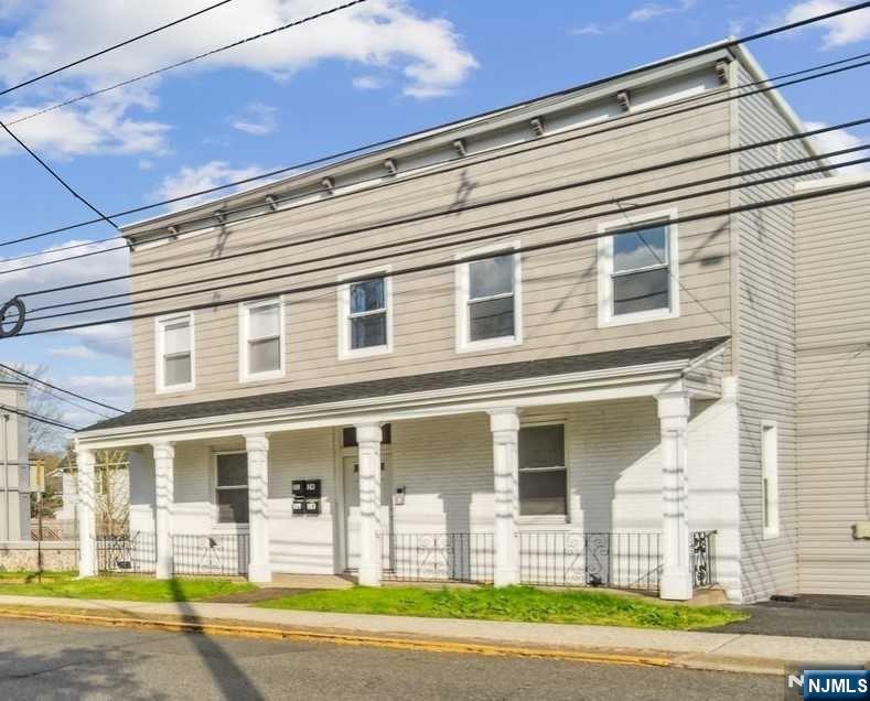 143 Valley Road, Unit 1R Montclair, NJ 07042 - Photo 2 of 18 a view of a building with a street