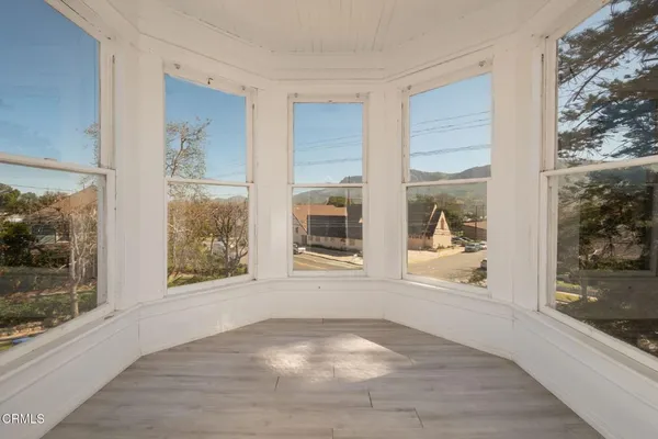 a view of an empty room and window