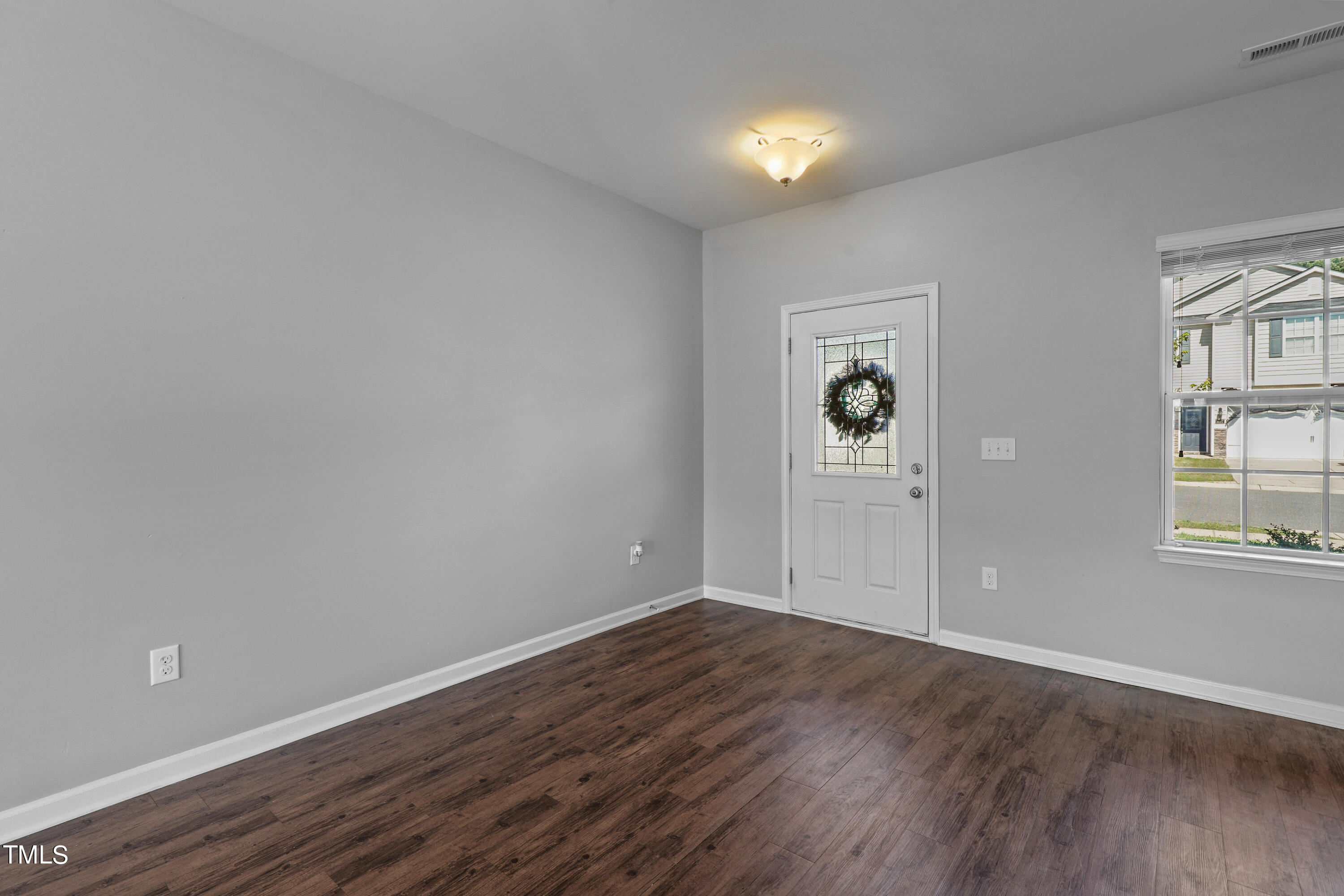 3636 Waleback Lane Raleigh, NC 27610 - Photo 6 of 36 an empty room with windows and closet