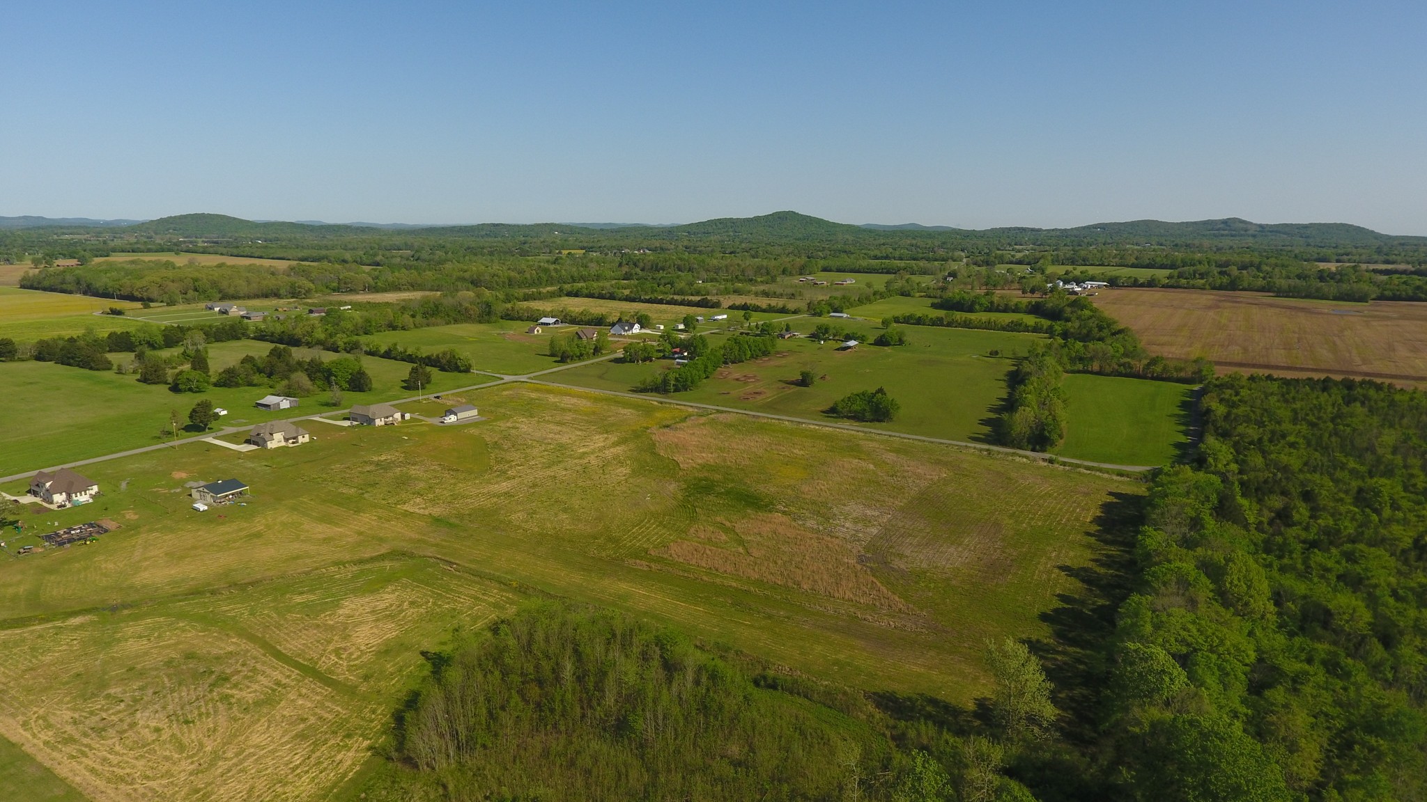 2100 Longview Road Bell Buckle, TN 37020 - Photo 1 of 8 a view of lake with mountain