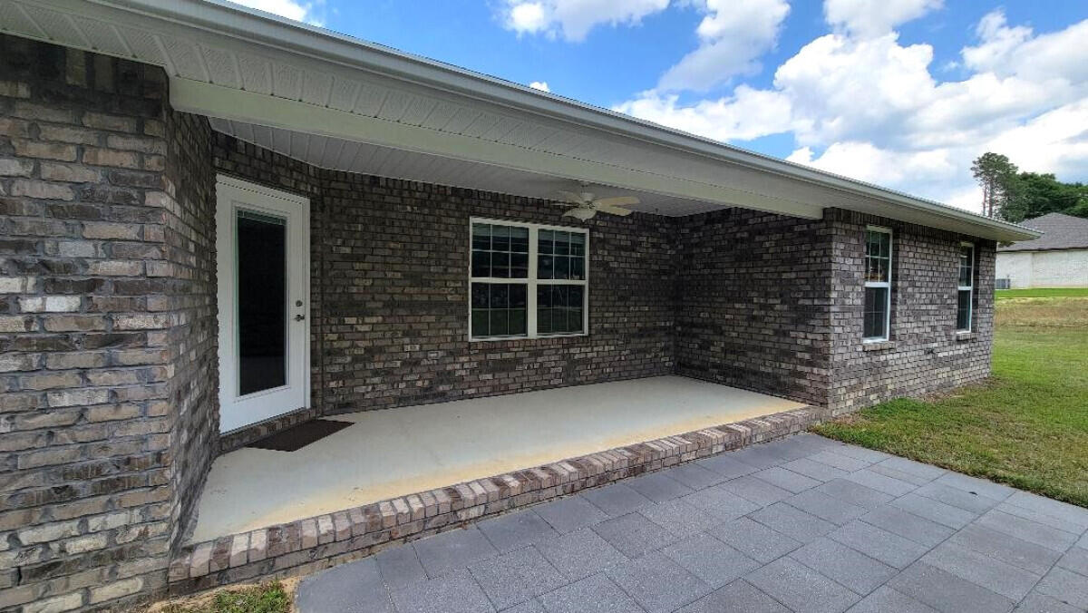 2816 Silverhill Road Crestview, FL 32536 - Photo 5 of 19 a front view of a house with a garage