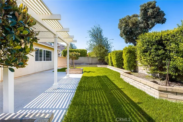 a view of swimming pool with a garden