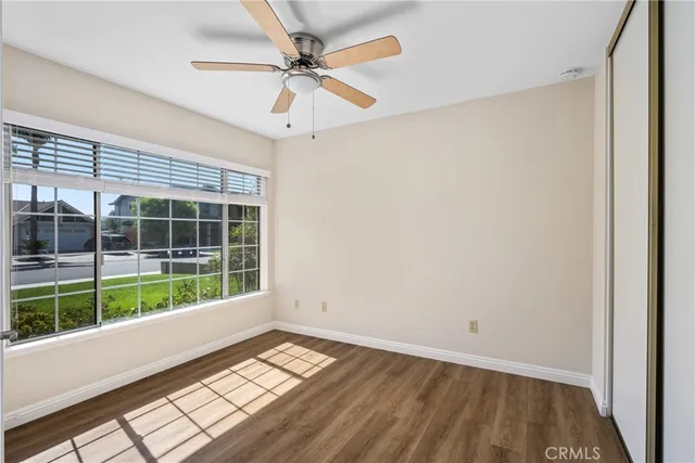 a view of a room with a large window