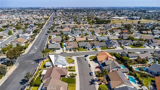 an aerial view of a city with lots of residential buildings