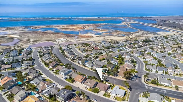 a view of a city with an ocean