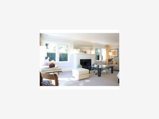 475 Embarcadero Road Palo Alto, CA 94301 - Photo 3 of 9 a living room with furniture and a fireplace