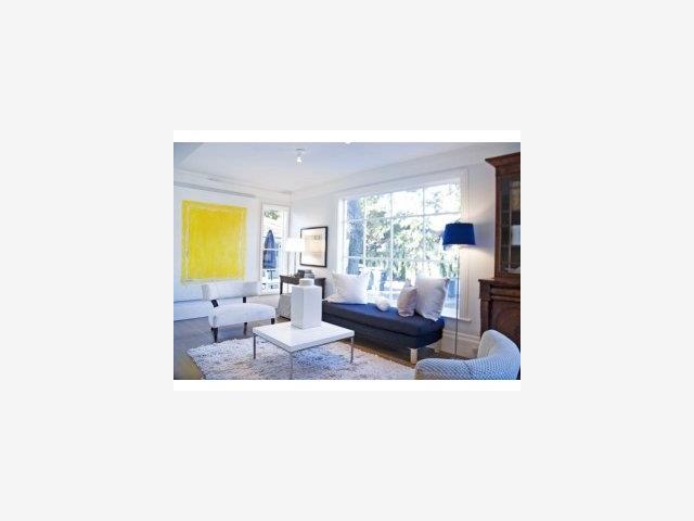 475 Embarcadero Road Palo Alto, CA 94301 - Photo 6 of 9 a living room with furniture and a large window