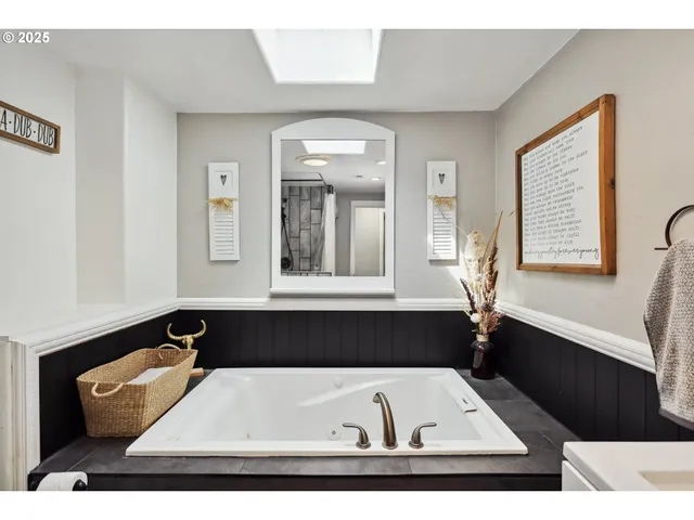 a black white and black room with a large window