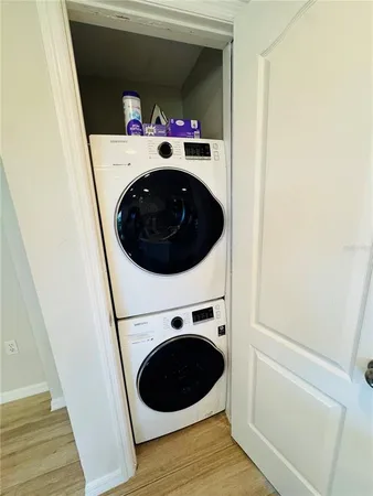 a utility room with dryer and washer