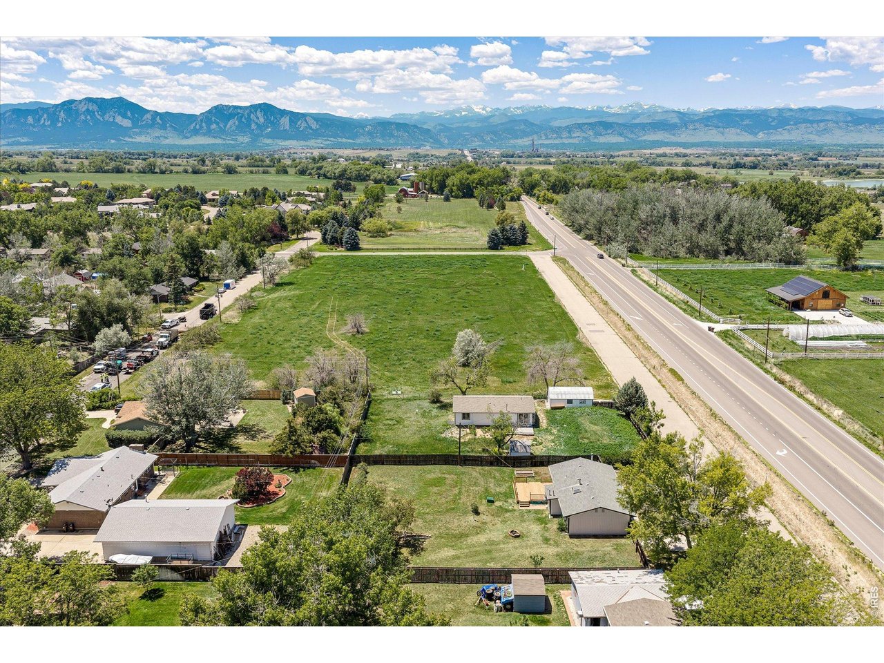 9234 Arapahoe Road Boulder, CO 80303 - Photo 36 of 43 expansive aerial perspective capturing the neighborhood, open land and stunning foothill backdrop