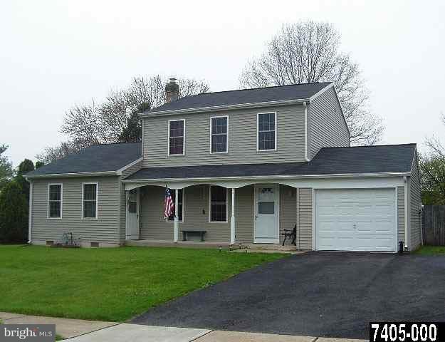 2548 Manor Road York, PA 17408 - Photo 1 of 1 a front view of a house with a garden