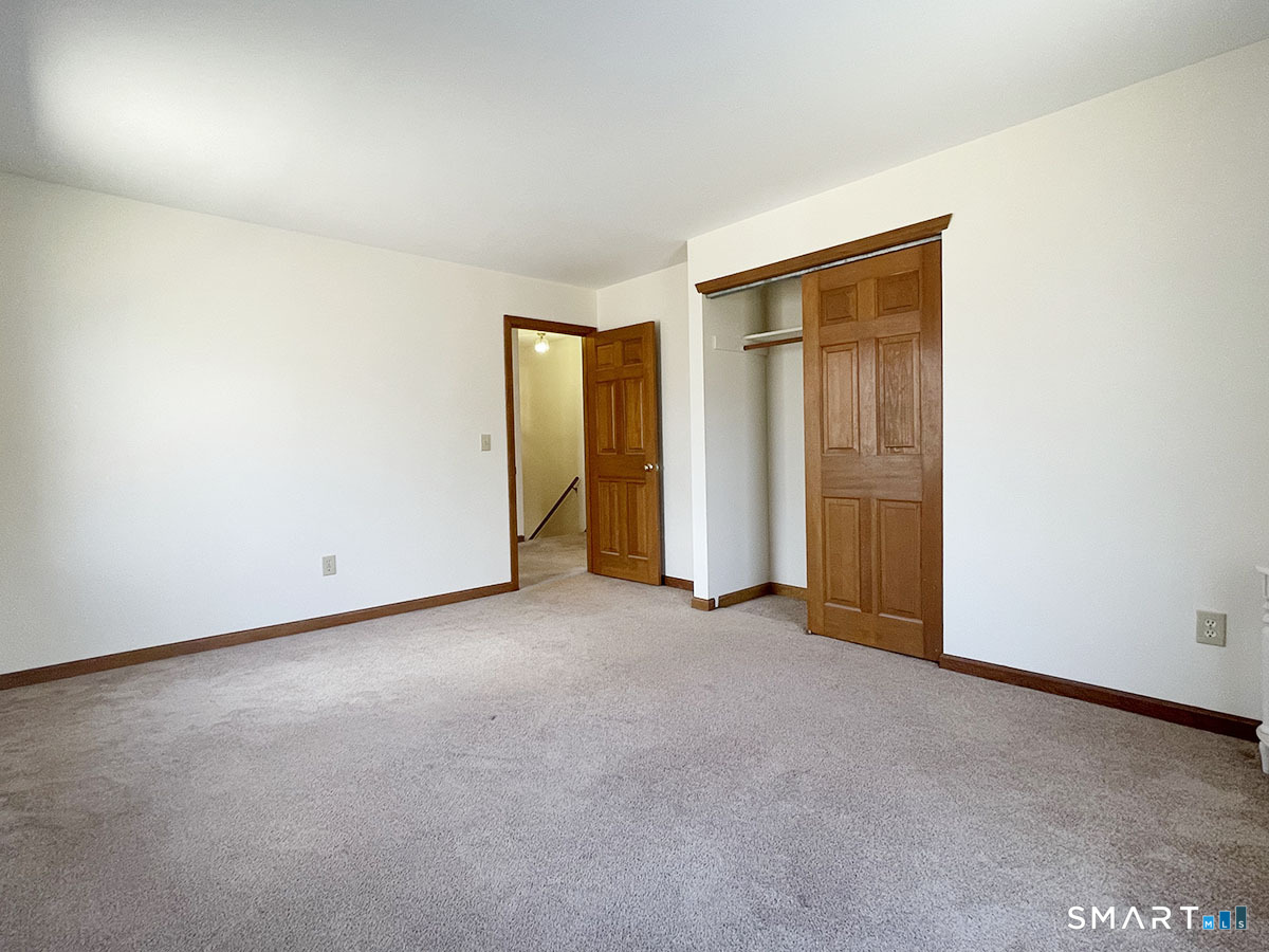 1315 Purchase Brook Road Southbury, CT 06488 - Photo 32 of 41 an empty room with closet area